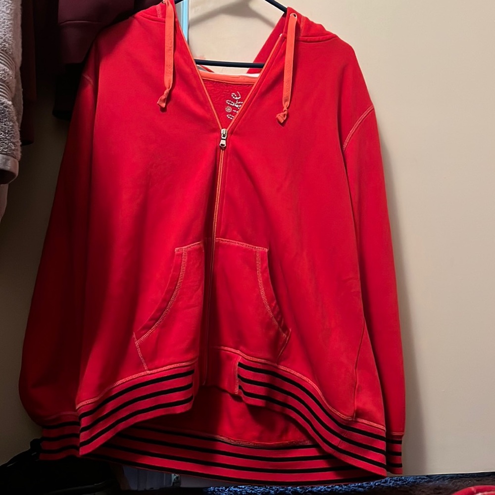 Ren jacket with stripes on the end of the sleeves and inside of hoodie